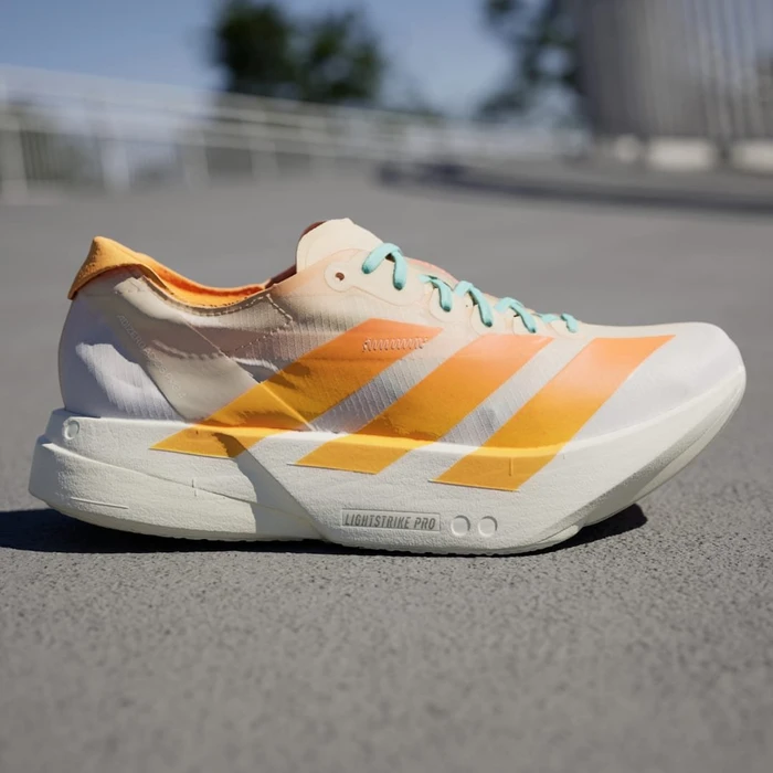 adidas Adizero Adios Pro 4 crystal sand/flash orange/flash aqua (Damen)