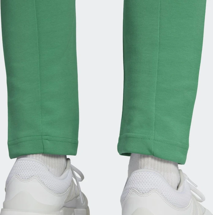 adidas Future Icons Badge of Sport Trainingshose lang semi court green (Herren)