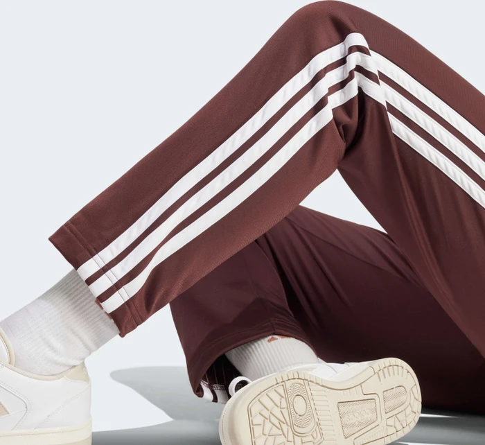 adidas Essentials 3-Streifen Trainingsanzug aurora ruby/brown (Damen)