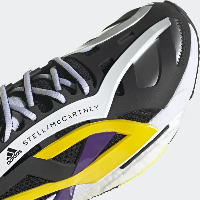 adidas Solar Glide by Stella McCartney core black/active purple/shock yellow (Damen)