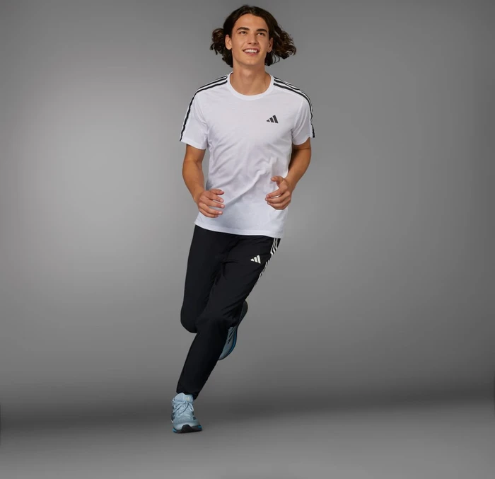adidas Own the Run 3-Streifen Trainingshose lang schwarz (Herren)