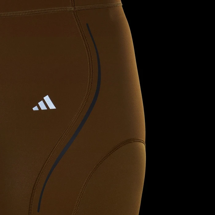 adidas Tailored HIIT Luxe Training Hose lang bronze strata (Damen)