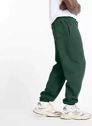New Balance Sports Essentials Fleece Trainingshose lang nightwatch green (Herren)
