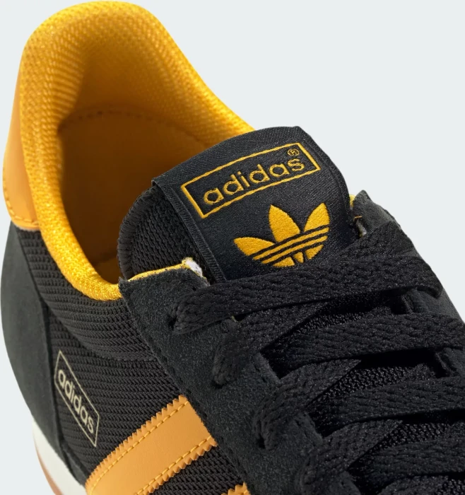 adidas R71 core black/crew yellow/gold metallic (Herren)
