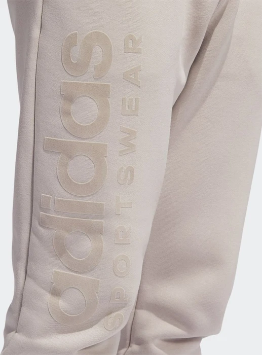 adidas Lounge Fleece Trainingshose lang wonder taupe (Herren)
