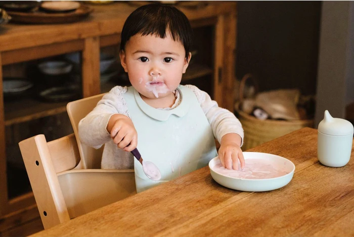 Stokke Munch Lätzchen soft mint