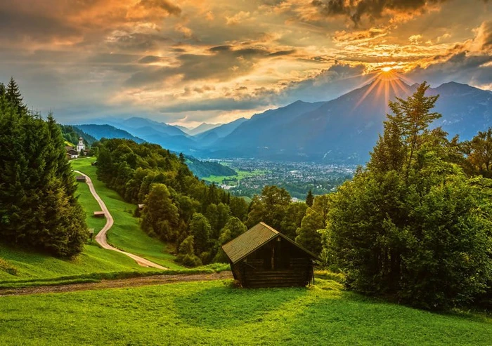 Schmidt Spiele Sonnenuntergang über dem Bergdorf Wamberg