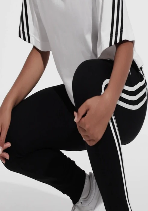 adidas Essentials 3-Streifen French Terry Cuffed Trainingshose lang schwarz/weiß (Damen)