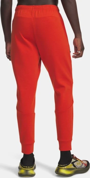 Under Armour Unstoppable Fleece Trainingshose lang surplus orange/black (Herren)