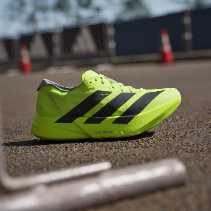 adidas Adizero Adios Pro 4 lucid lemon/core black/halo silver (Damen)
