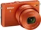 Nikon 1 J4 orange mit Objektiv 1 NIKKOR 10-30mm 3.5-5.6 PD-Zoom VR Vorschaubild