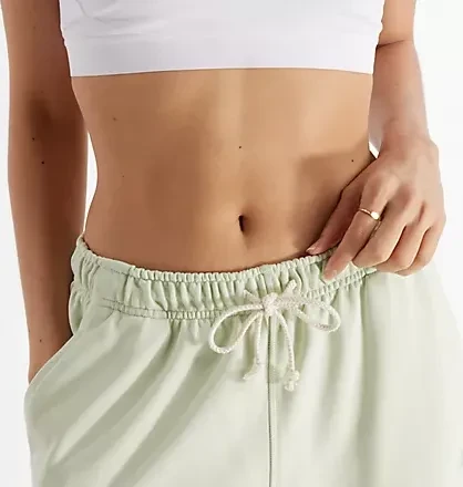 New Balance Athletics French Terry Trainingshose lang natural mint (Damen)