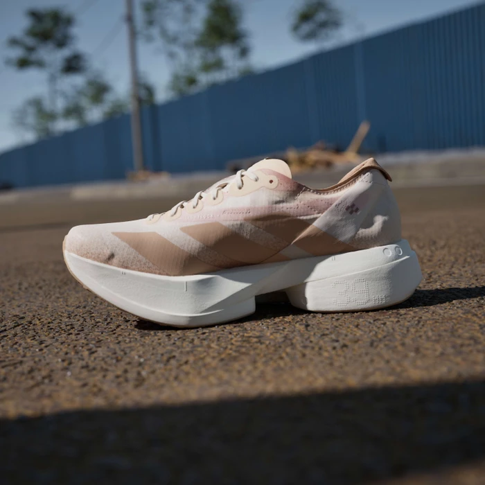adidas Adizero Adios Pro 4 chalk white/warm sandstone/semi impact orange (Damen)