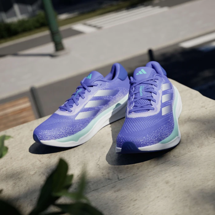 adidas Supernova Stride cobalt blue/zero metalic/purple tint (Damen)