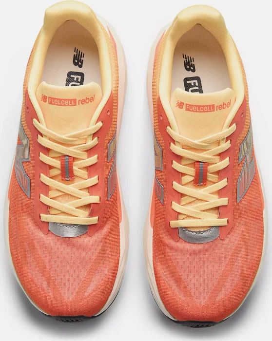 New Balance FuelCell Rebel v5 tangerine heat/silver metallic (Herren)