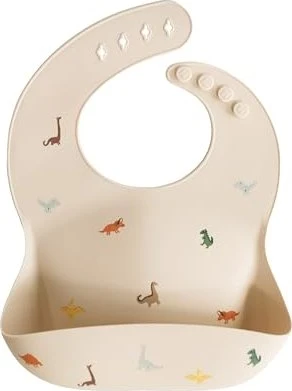 Mushie Silikon Lätzchen dinosaurs beige