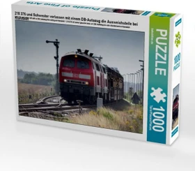 Calvendo 218 376 und Schwester verlassen mit einem DB-Autozug die Ausweichstelle bei Klanxbüll