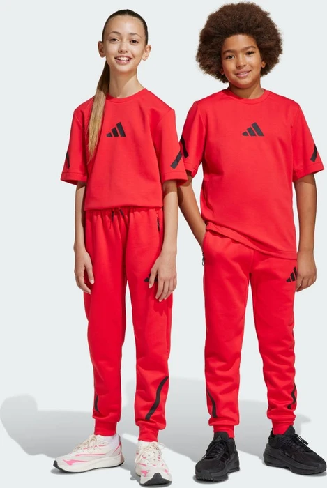 adidas Tapered-Leg Z.N.E. Trainingshose lang pure ruby/black (Junior)