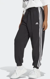adidas Essentials 3-Streifen French Terry Loose-Fit Trainingshose lang schwarz/weiß (Damen)