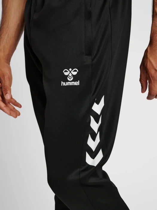 hummel Core XK Poly Trainingshose lang schwarz
