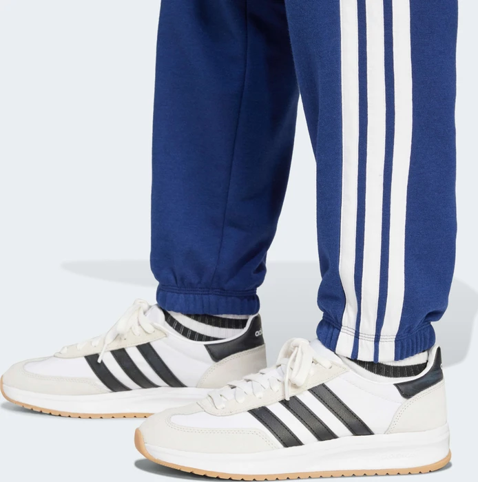 adidas Essentials 3-Streifen French Terry Cuffed Trainingshose lang dark blue/white (Damen)