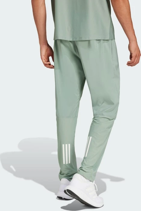 adidas Own the Run Trainingshose lang silver green (Herren)