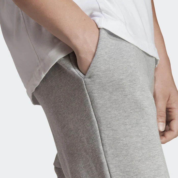 adidas Essentials French Terry Tapered Cuff Logo Trainingshose lang medium grey heather (Herren)