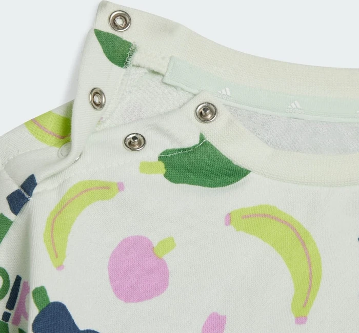 adidas Essentials Allover Print Trainingsanzug crystal jade/preloved ink (Junior)