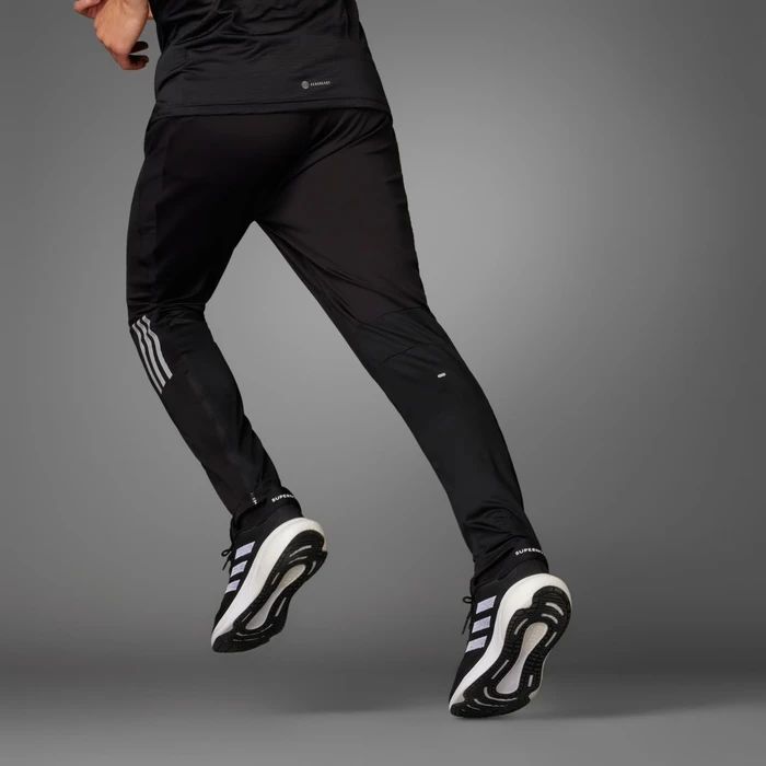 adidas Own the Run Astro Knit Trainingshose lang schwarz (Herren)