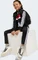 adidas Seasonal Essentials Tiberio 3-Streifen Tricot Trainingsanzug black/white/pure ruby (Junior) Vorschaubild