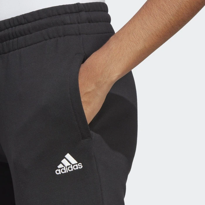 adidas Essentials Linear French Terry Cuffed Trainingshose lang schwarz/weiß (Damen)