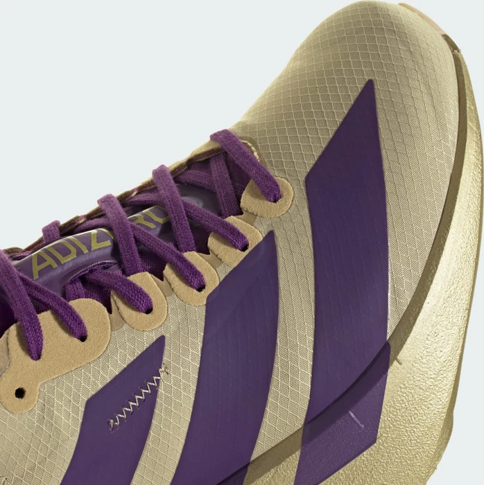 adidas Adizero Adios Pro 4 sand/rich purple/gold metallic (Damen)