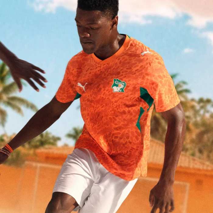 Puma FIFA WM 2026 Elfenbeinküste Heimtrikot kurzarm rickie orange/sport green (Damen)