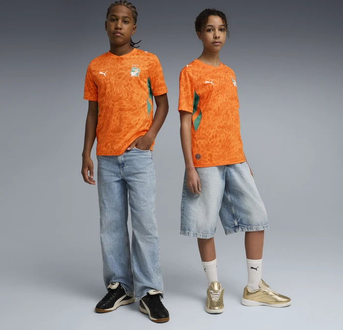 Puma FIFA WM 2026 Elfenbeinküste Heimtrikot kurzarm rickie orange/sport green (Junior)