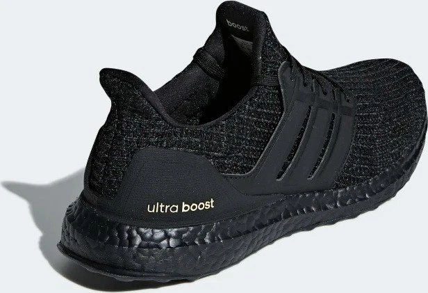 adidas Ultraboost core black/gold metallic (Damen)