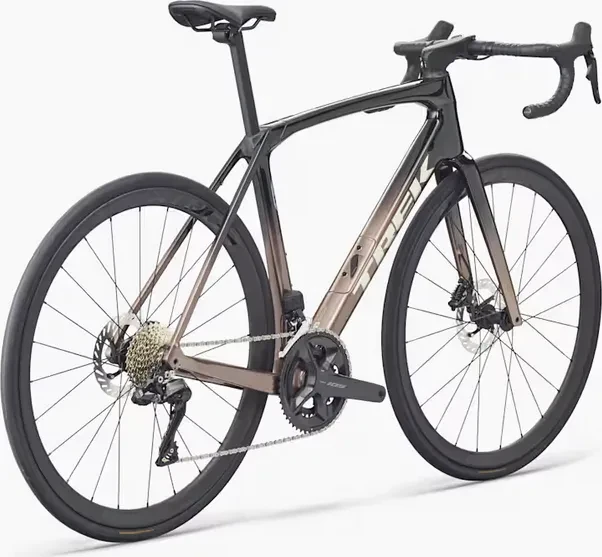 Trek Domane SL 6 Gen 4 dark star/bronze age fade Modell 2026