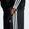 adidas Adicolor Satin Wide Leg Trainingshose lang schwarz (Damen) Vorschaubild