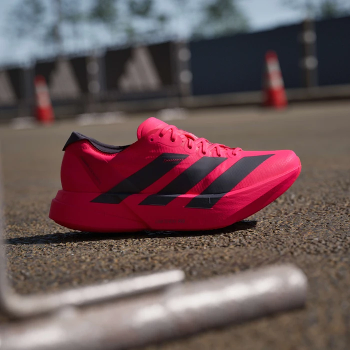 adidas Adizero Adios Pro 4 luci/core black (Damen)
