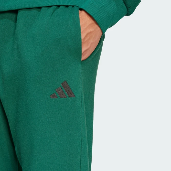 adidas Essentials Feel Cozy French Terry Trainingshose lang collegiate green/black (Herren)