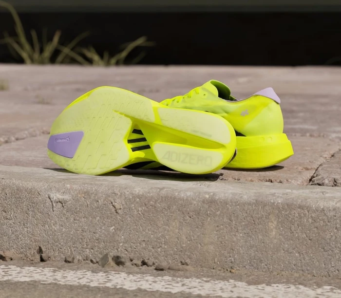 adidas Adizero Adios Pro 4 solar yellow/aurora plum/powder plum (Damen)
