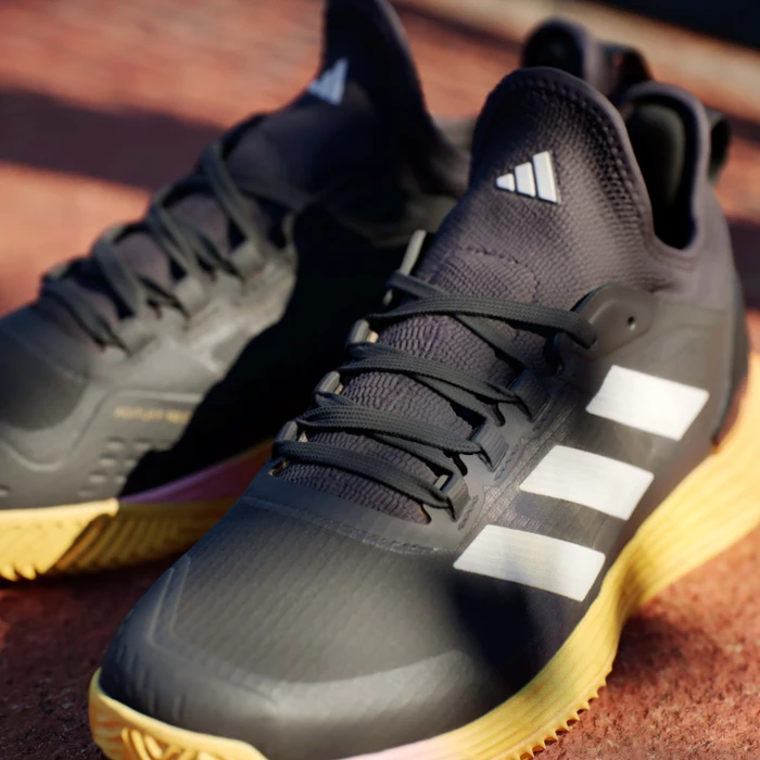 adidas Adizero Ubersonic 4.1 aurora black/zero metalic/spark (Herren)