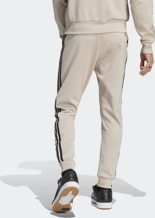 adidas Adicolor Classics SST Trainingshose lang wonder beige/black (Herren)
