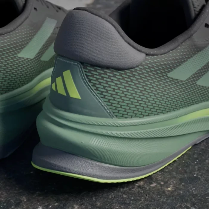 adidas Supernova Rise core black/preloved green/lucid lemon (Herren)