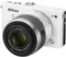 Nikon 1 J4 weiß mit Objektiv 1 NIKKOR 10-30mm 3.5-5.6 PD-Zoom VR und 1 NIKKOR 30-110mm 3.8-5.6 VR Vorschaubild