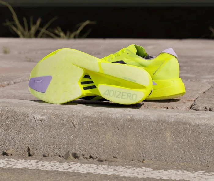 adidas Adizero Adios Pro 4 solar yellow/aurora plum/powder plum (Herren)