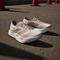 adidas Adizero Adios Pro 4 chalk white/warm sandstone/semi impact orange (Damen) Vorschaubild