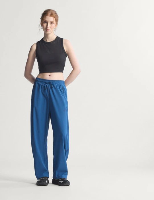 adidas Z.N.E. Woven Trainingshose lang dusky petrol (Damen)