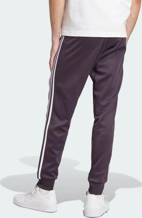 adidas Adicolor Classics SST Trainingshose lang aurora black (Herren)