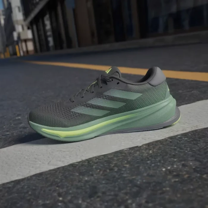 adidas Supernova Rise core black/preloved green/lucid lemon (Herren)