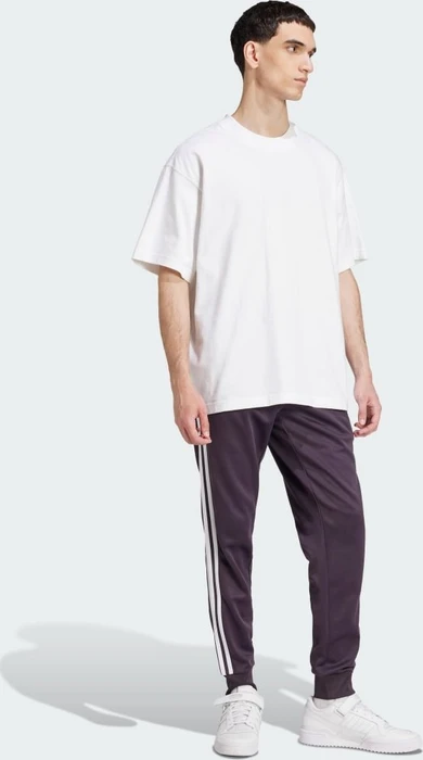 adidas Adicolor Classics SST Trainingshose lang aurora black (Herren)